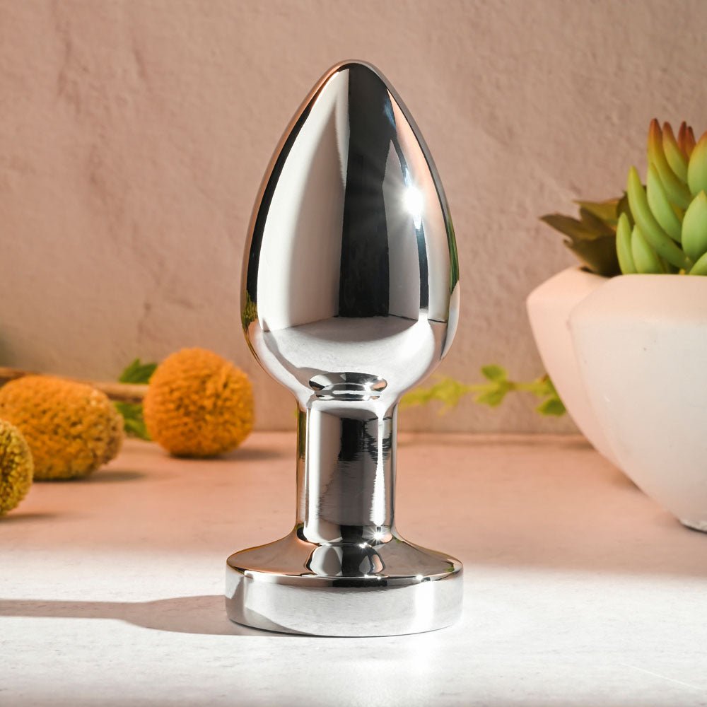 Gender X ROCKIN METAL PLUG XL - Chrome 10.5 cm USB Rechargeable Vibrating XL Butt Plug - Silk and Sin