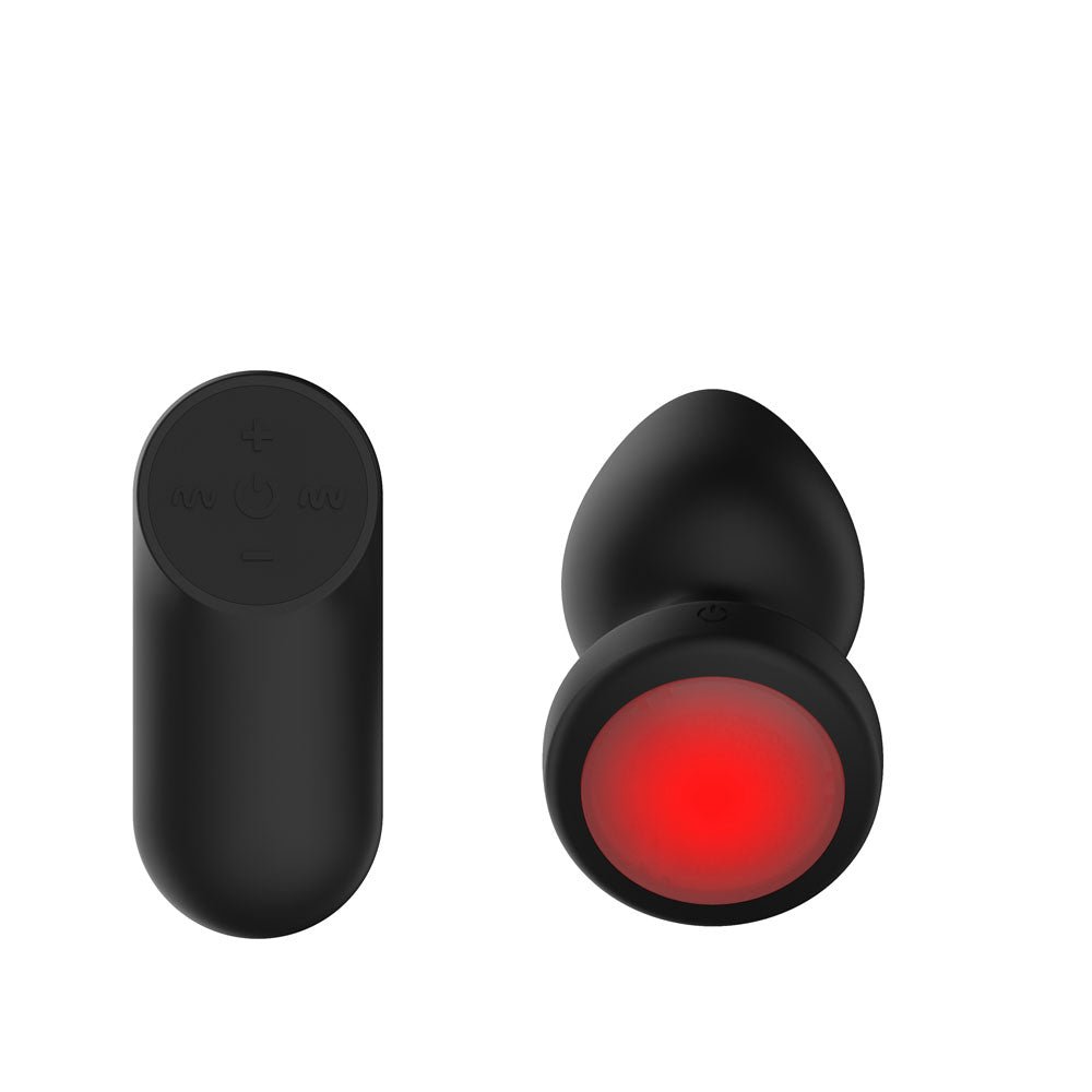 Passion Play Vibrating Butt Plug with LED Base - M - Black 10.4 cm USB Rechargeable Vibrating Butt Plug with LED Base and Wireless Remote - Silk and Sin