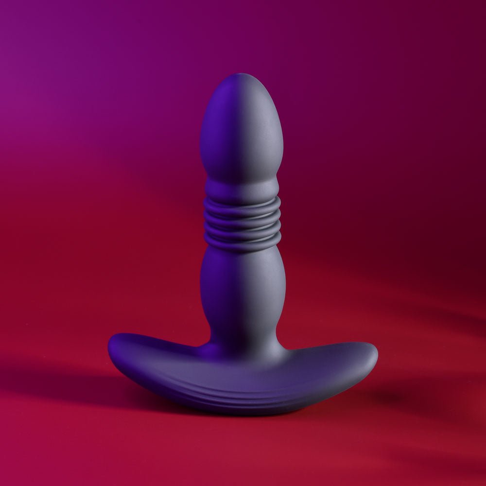 Playboy Pleasure TRUST THE THRUST - Black 13.7 cm USB Rechargeable Thrusting Butt Plug with Wireless Remote - silkandsin
