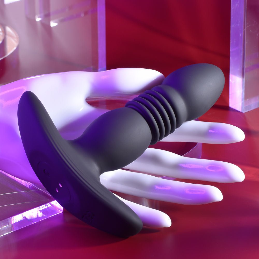 Playboy Pleasure TRUST THE THRUST - Black 13.7 cm USB Rechargeable Thrusting Butt Plug with Wireless Remote - silkandsin
